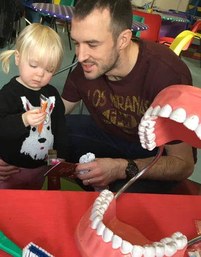 Brush-Baby Teamed Up With Nottingham Oral Health Promotion Team with bristles toothbrush