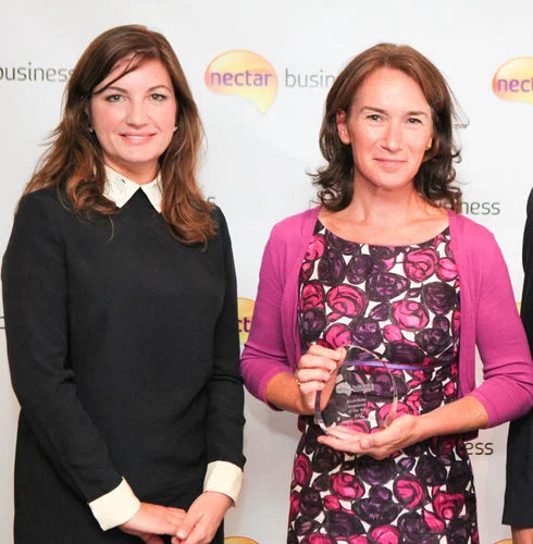International Womens Day with our owner Dominique Tillen with Karren Brady with baby chewable first toothbrush