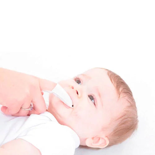 Baby using Brush Baby teething wipes
