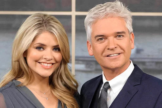 Holly Willoughby and Phillip Schofield from ITV This Morning programme featuring brush baby chewable toothbrush for babies